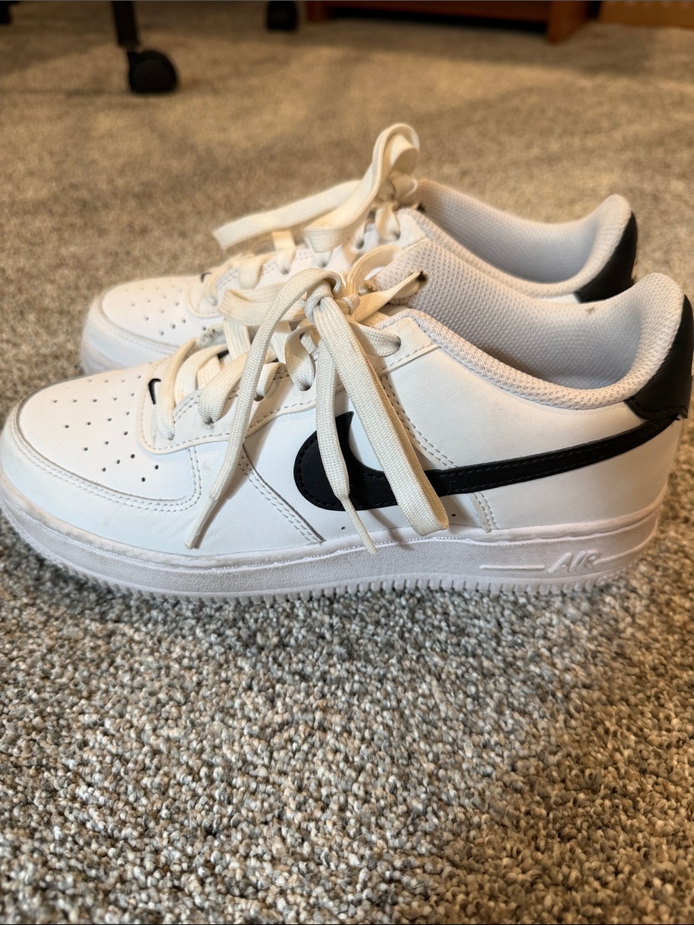 Nike Kids White Sneakers with Black Swoosh
